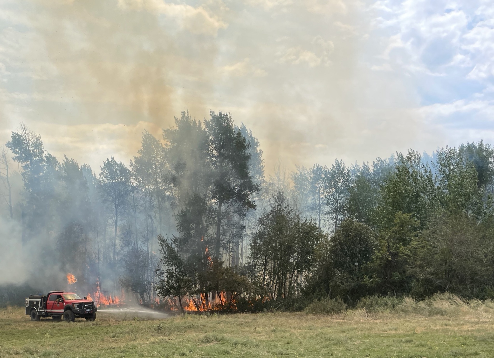 Brush truck defending property